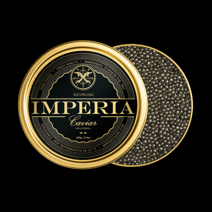 Open 250g tin of Imperia Sevruga Caviar with fine grey-brown pearls and branded black and gold lid on a black background.