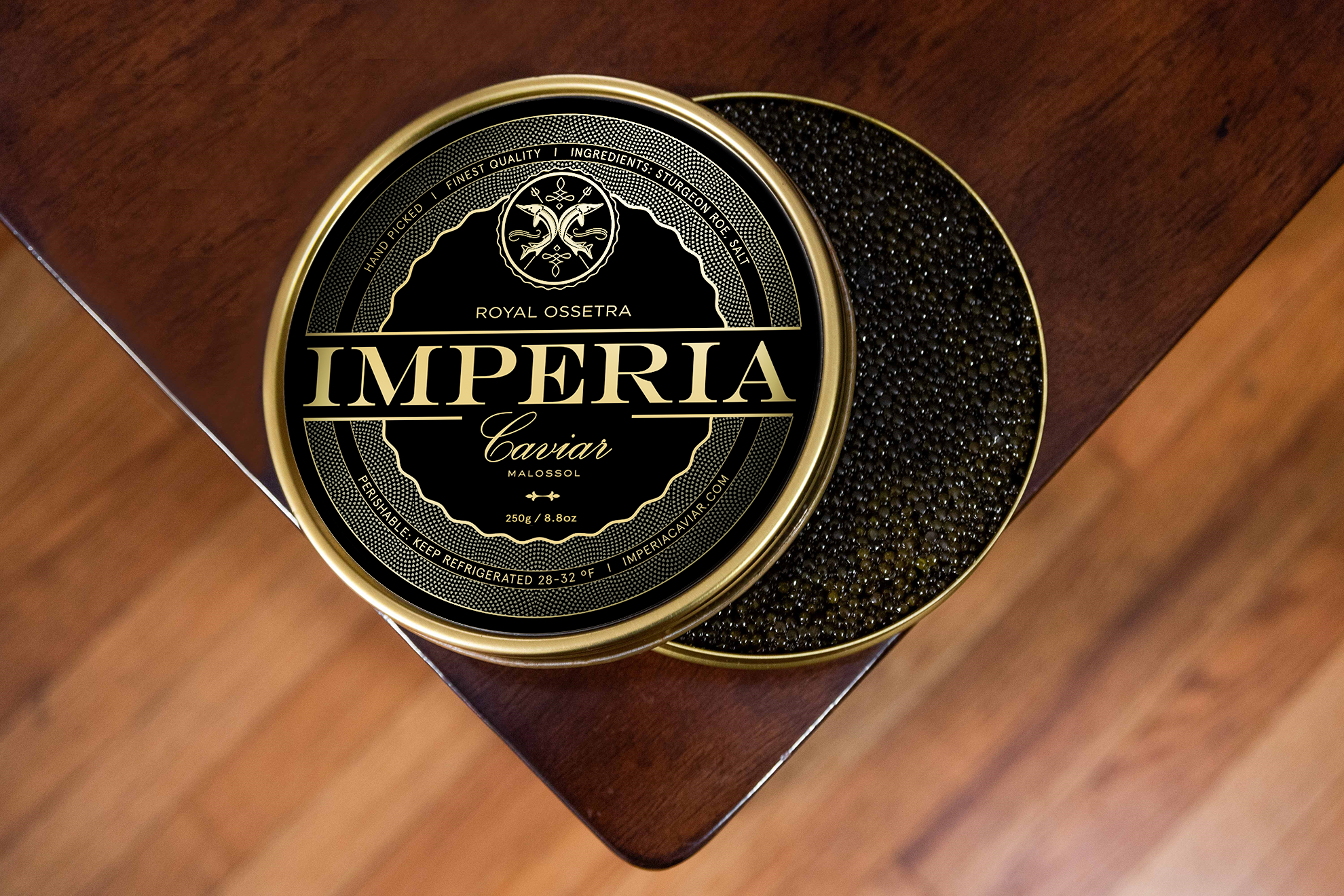 Tin of Imperia caviar on a wooden table.